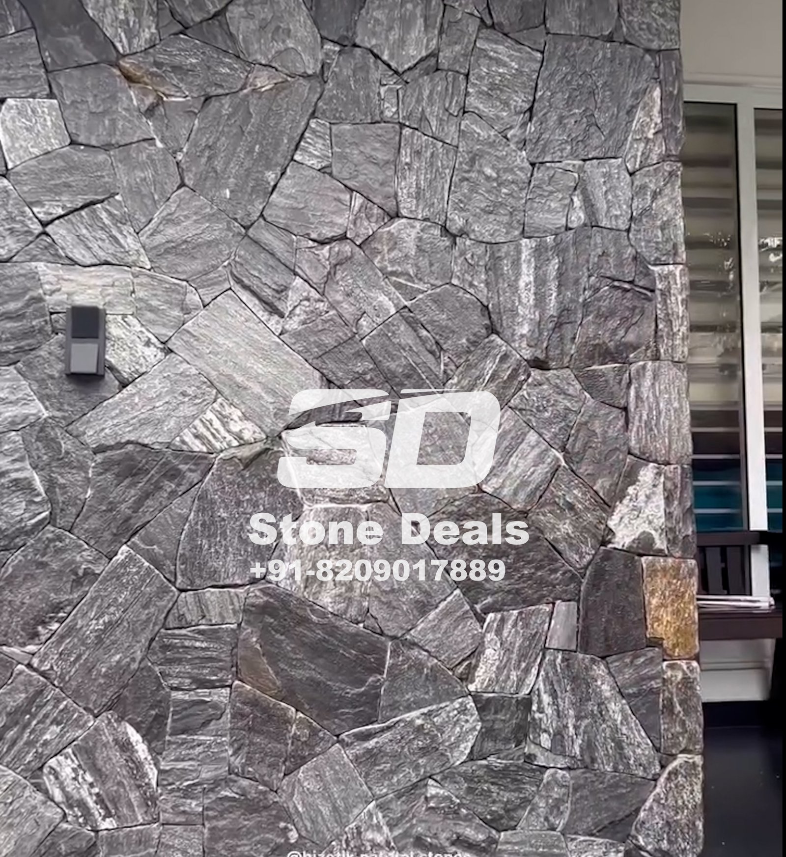 gray and black stone wall cladding